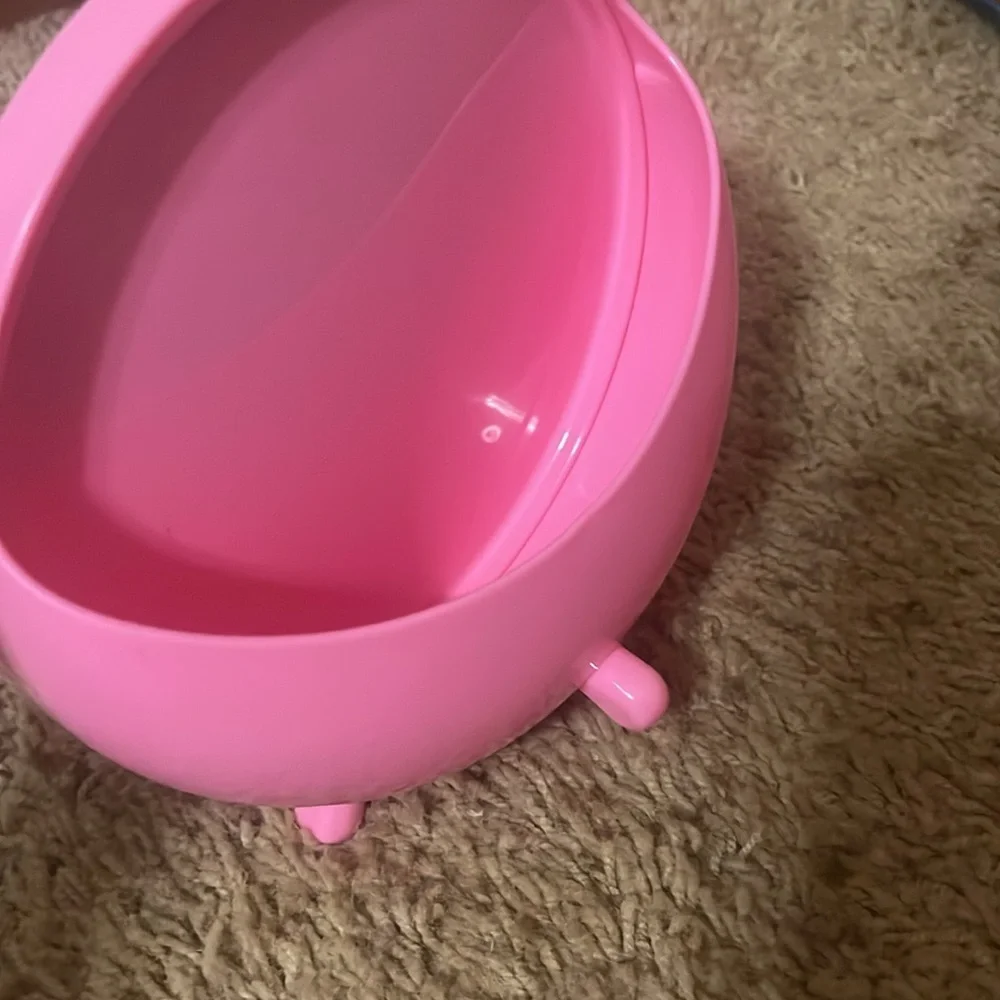 Pink mini mirror with small cubby/holder in the back
